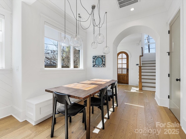 dining area featuring light wood-type flooring