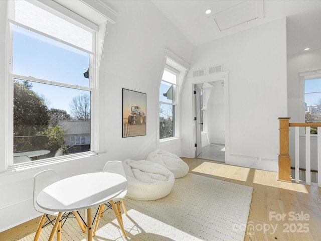 sitting room with light hardwood / wood-style floors