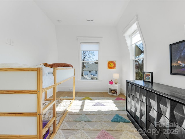 bedroom with light hardwood / wood-style flooring