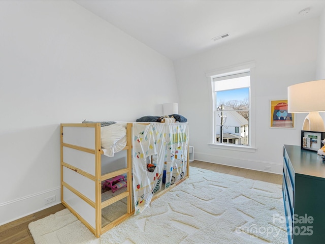 bedroom featuring hardwood / wood-style floors