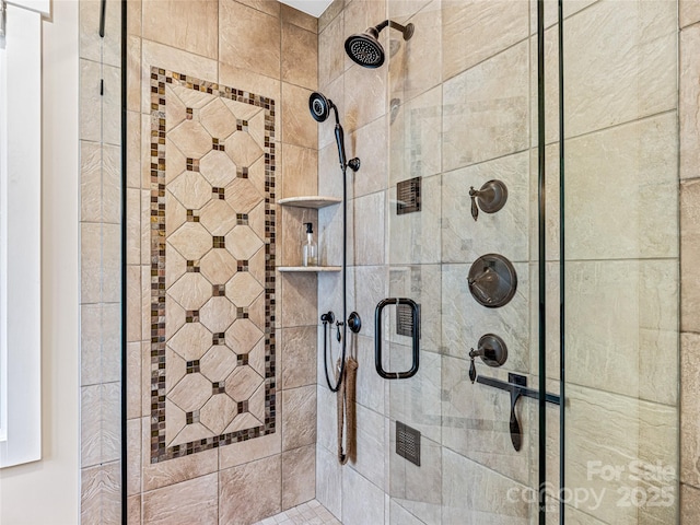 bathroom featuring a shower stall