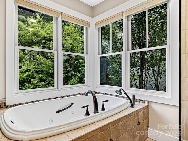 bathroom featuring a jetted tub