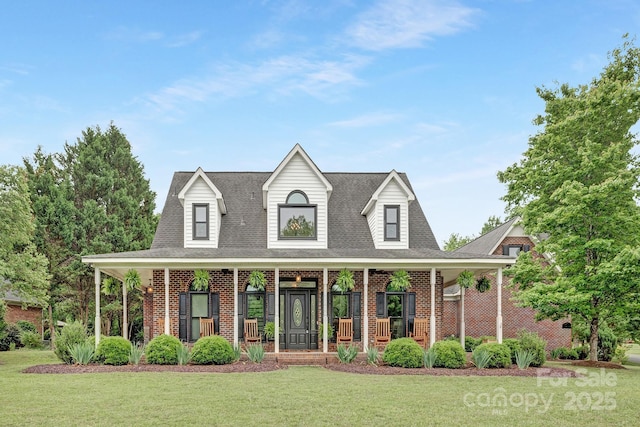 3300 Chancellor Ln, Monroe, NC 28110 - view of front of home with a porch, brick siding, and a front yard