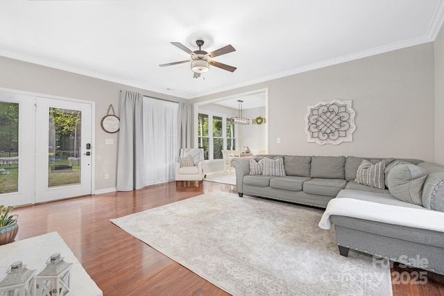 3300 Chancellor Ln, Monroe, NC 28110 - living area featuring a ceiling fan, crown molding, wood finished floors, and baseboards