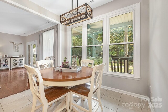 3300 Chancellor Ln, Monroe, NC 28110 - dining area featuring light tile patterned floors and baseboards