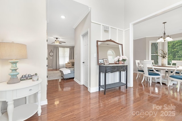 3300 Chancellor Ln, Monroe, NC 28110 - interior space with a chandelier, wood finished floors, ornamental molding, a ceiling fan, and baseboards