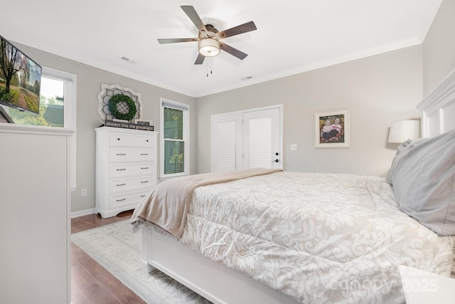 3300 Chancellor Ln, Monroe, NC 28110 - bedroom with wood finished floors, ornamental molding, baseboards, and ceiling fan