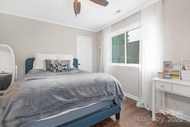 3300 Chancellor Ln, Monroe, NC 28110 - bedroom featuring crown molding, wood finished floors, baseboards, and a ceiling fan