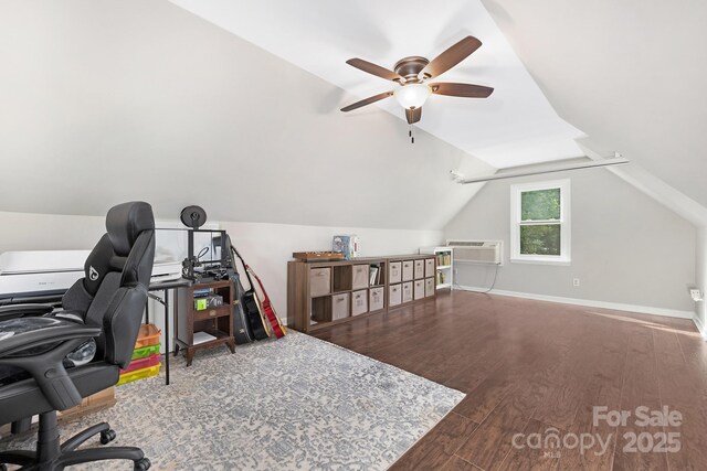 3300 Chancellor Ln, Monroe, NC 28110 - office featuring a ceiling fan, wood finished floors, vaulted ceiling, a wall mounted AC, and baseboards