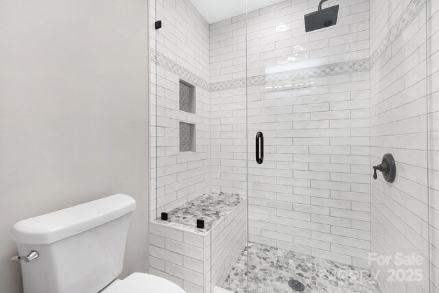 3300 Chancellor Ln, Monroe, NC 28110 - bathroom with toilet and a shower stall
