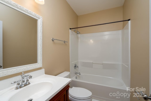 full bathroom featuring vanity, shower / bathtub combination, and toilet