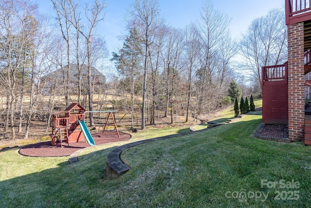 view of yard with a playground