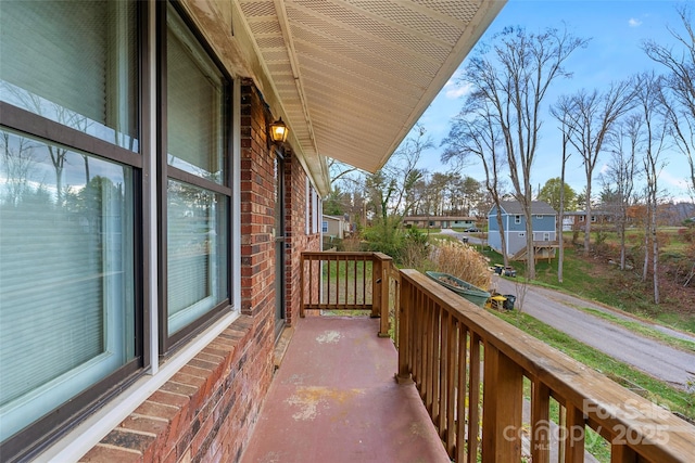 balcony featuring covered porch