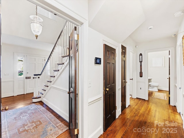 entrance foyer with hardwood / wood-style floors