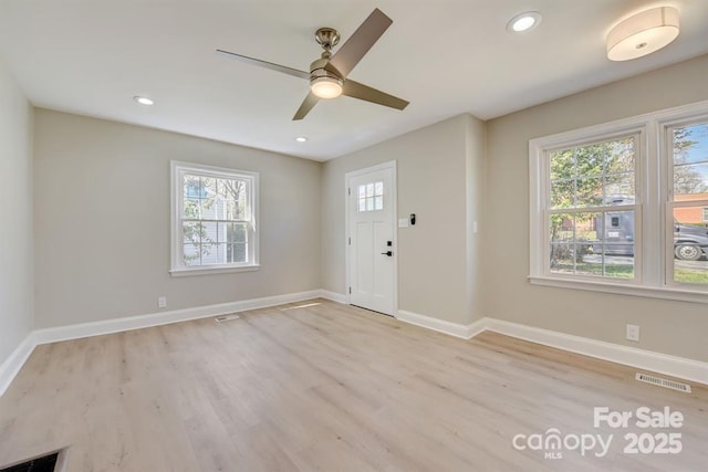 entryway featuring ceiling fan and light hardwood / wood-style floors