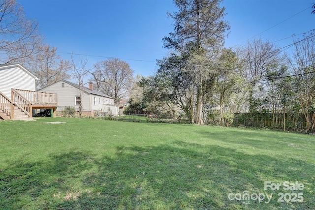 view of yard with a deck