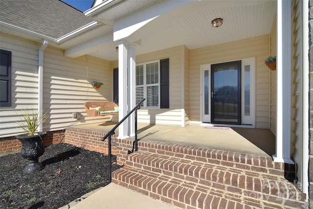 property entrance with a porch