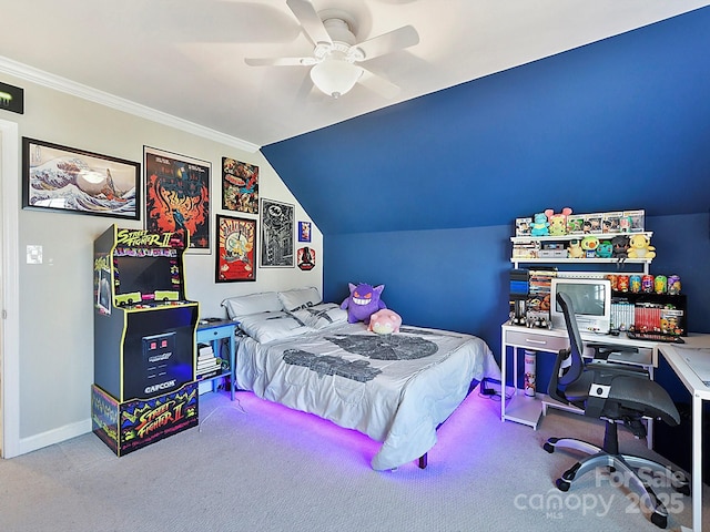 bedroom featuring ornamental molding, vaulted ceiling, carpet floors, and ceiling fan