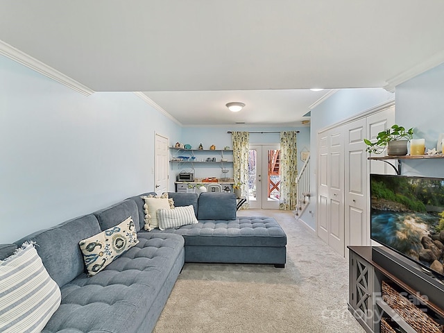 living room with crown molding, light carpet, and french doors