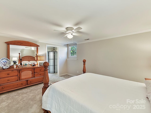 bedroom featuring crown molding, light colored carpet, and ceiling fan