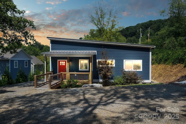 modern home with covered porch