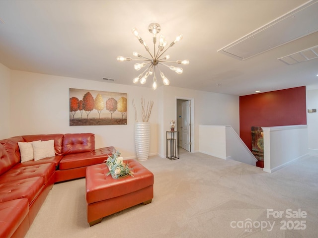 living room featuring a chandelier and carpet flooring