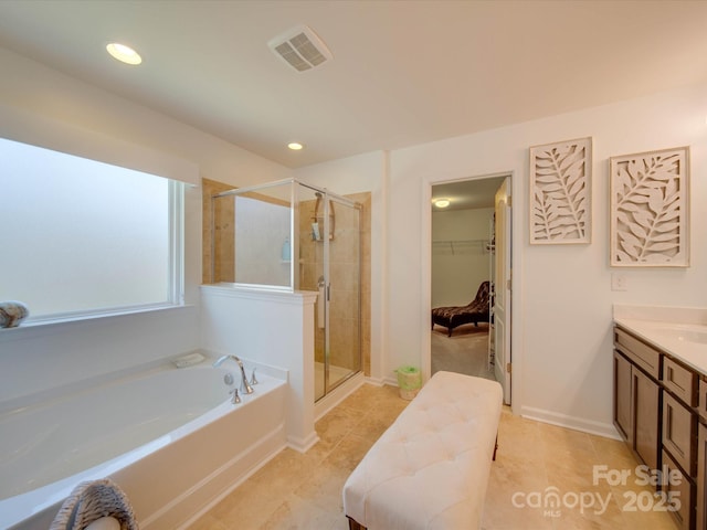 bathroom with vanity, separate shower and tub, and tile patterned floors