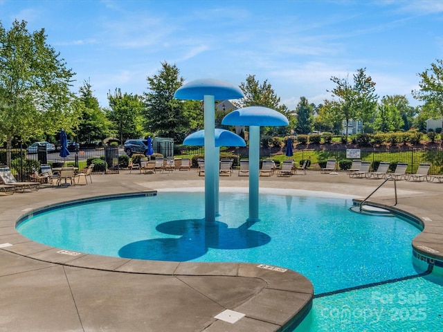 view of swimming pool featuring a patio