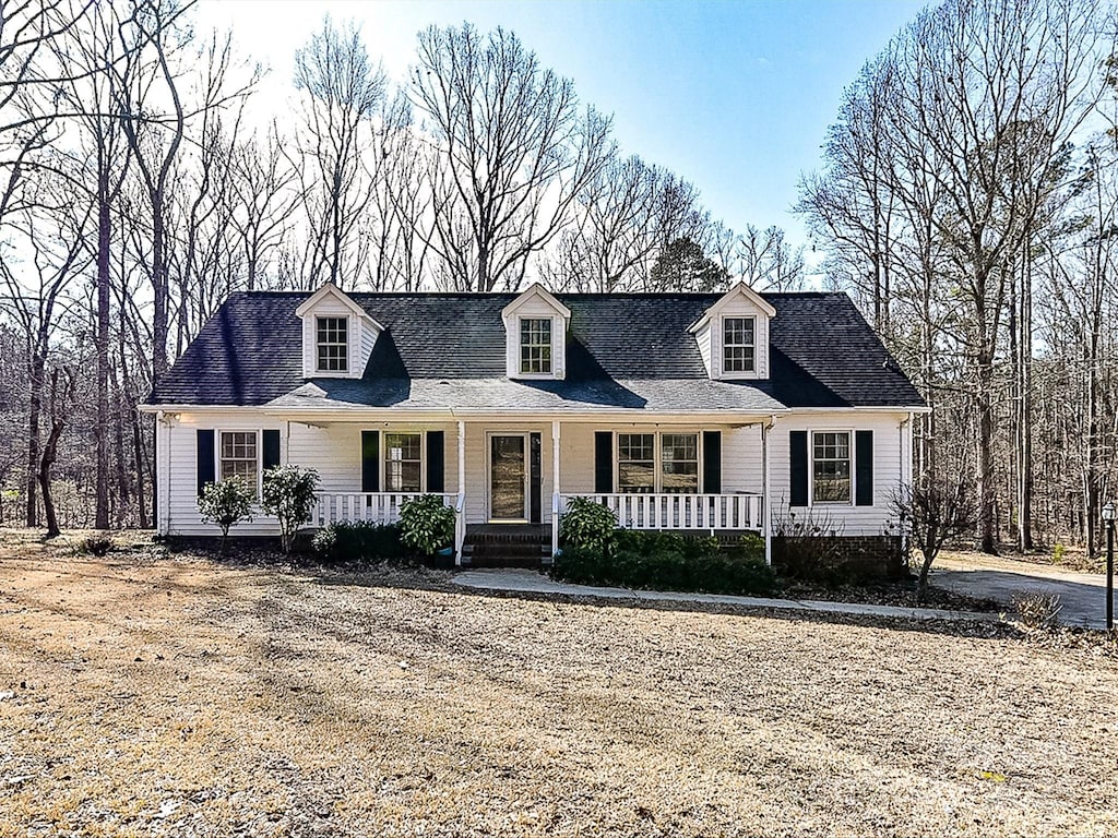 cape cod house with covered porch