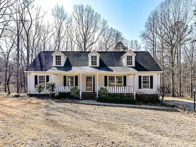 cape cod house with covered porch