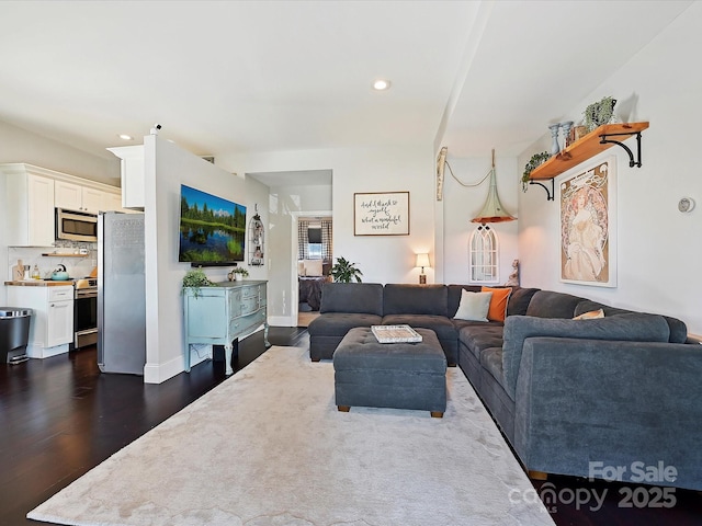 living room with dark wood-type flooring