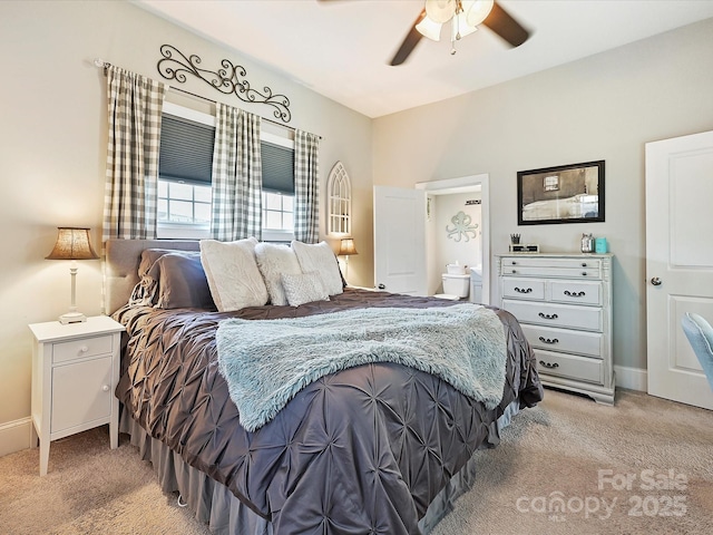 bedroom with ceiling fan and light colored carpet