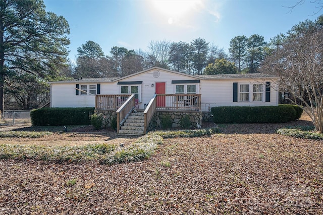 view of front of property featuring a deck