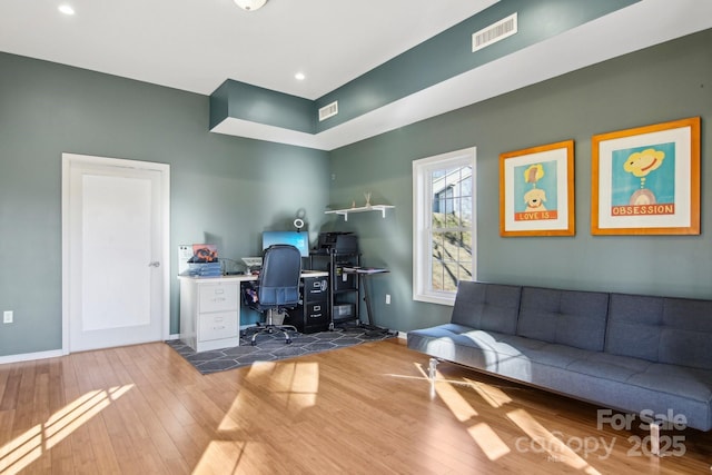 office area with wood-type flooring