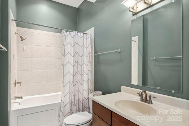 full bathroom with toilet, vanity, and shower / bath combo with shower curtain