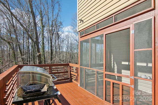 wooden deck with area for grilling