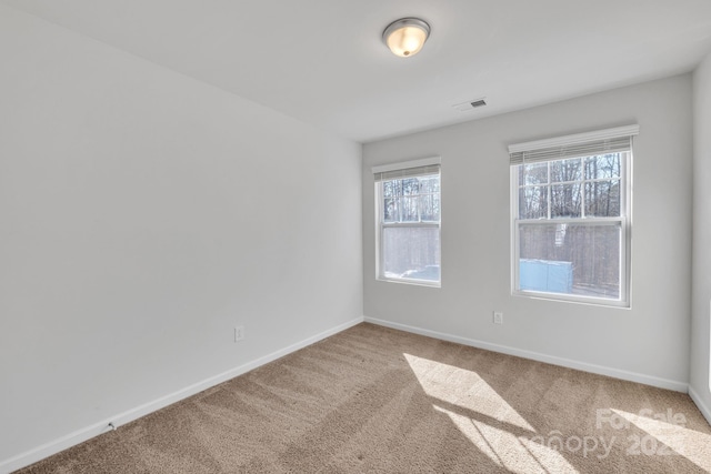 view of carpeted spare room