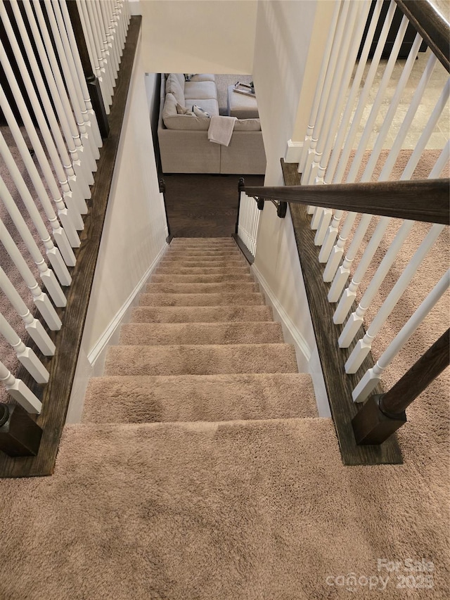 staircase with baseboards