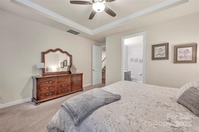 4929 Norman Park Pl, Clover, SC 29710 - carpeted bedroom with connected bathroom, a raised ceiling, visible vents, baseboards, and a ceiling fan