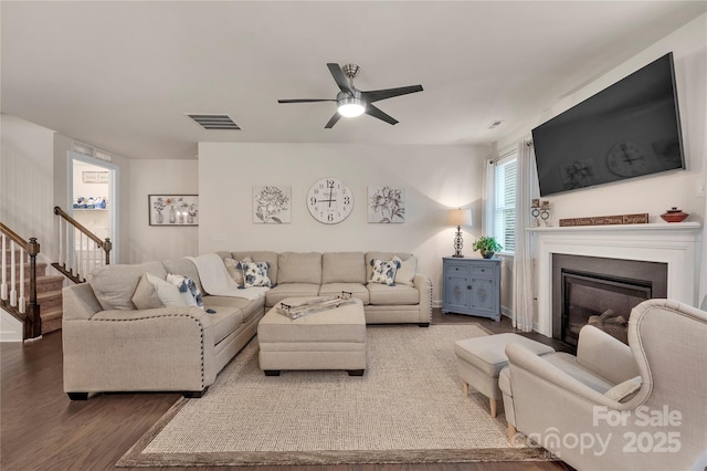 4929 Norman Park Pl, Clover, SC 29710 - living area with visible vents, ceiling fan, wood finished floors, and a glass covered fireplace