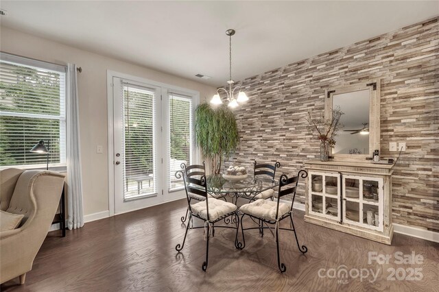 4929 Norman Park Pl, Clover, SC 29710 - dining space with baseboards, visible vents, wood finished floors, and plenty of natural light