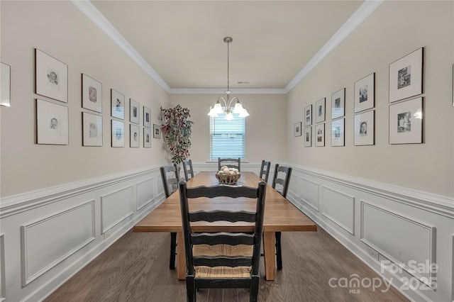 4929 Norman Park Pl, Clover, SC 29710 - dining space featuring ornamental molding, a notable chandelier, dark wood-style flooring, and a decorative wall