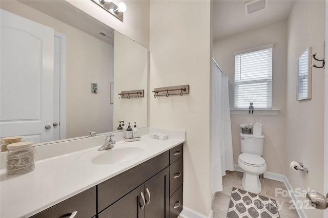 4929 Norman Park Pl, Clover, SC 29710 - bathroom featuring tile patterned flooring, toilet, vanity, baseboards, and visible vents