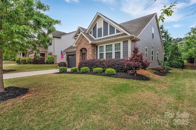 4929 Norman Park Pl, Clover, SC 29710 - view of front of home with a shingled roof, driveway, stone siding, a front yard, and an attached garage