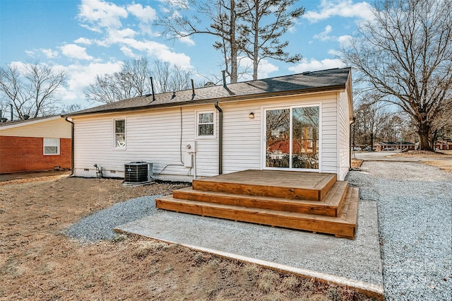 rear view of property with central air condition unit