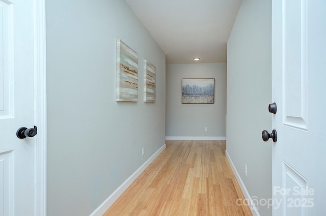 corridor featuring light hardwood / wood-style flooring