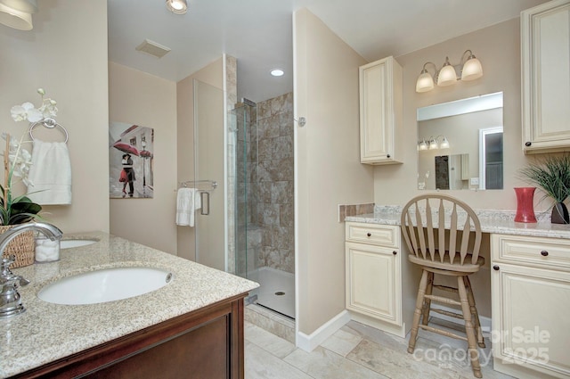 bathroom with vanity and walk in shower