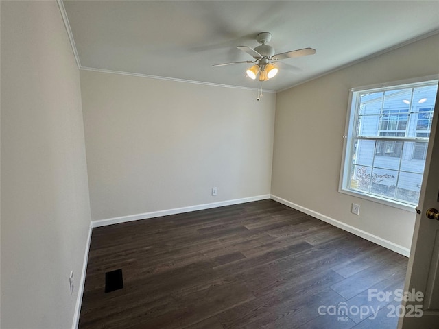 436 Riverwind Dr, Hendersonville, NC 28739 - spare room featuring crown molding, ceiling fan, and dark hardwood / wood-style floors