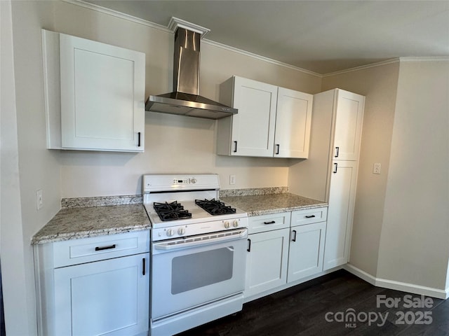 436 Riverwind Dr, Hendersonville, NC 28739 - kitchen featuring wall chimney range hood, light stone countertops, white cabinets, and white gas stove