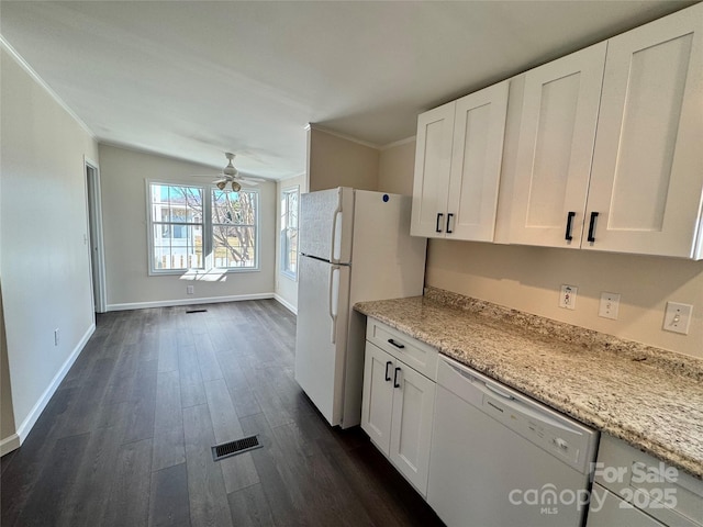 436 Riverwind Dr, Hendersonville, NC 28739 - kitchen featuring white appliances, ornamental molding, light stone countertops, and white cabinets